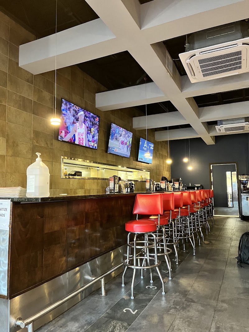 Eats Cafe — Diner in Seven Mile Beach, Grand Cayman